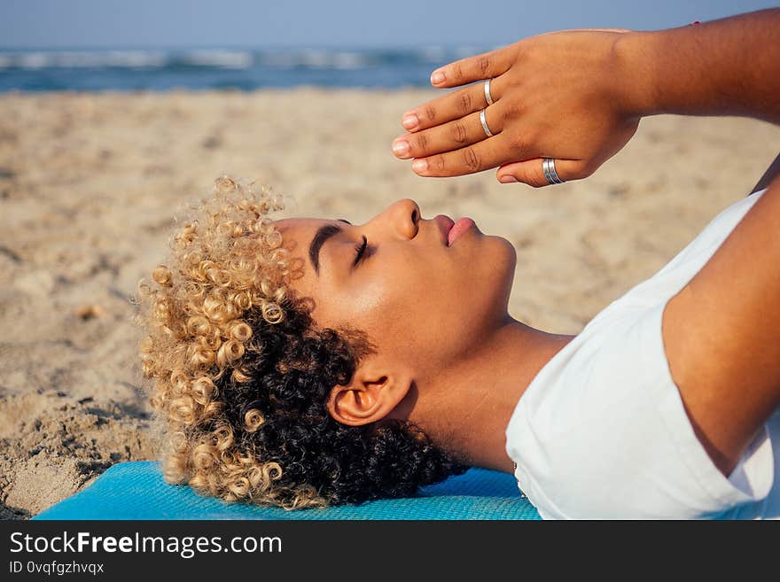 Brazilian Hispanic Woman Training Yoga On The Beach