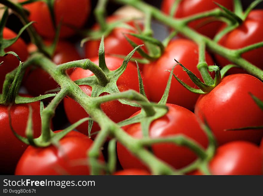 Cherry tomatoes on a wood table. Cherry tomatoes on a wood table