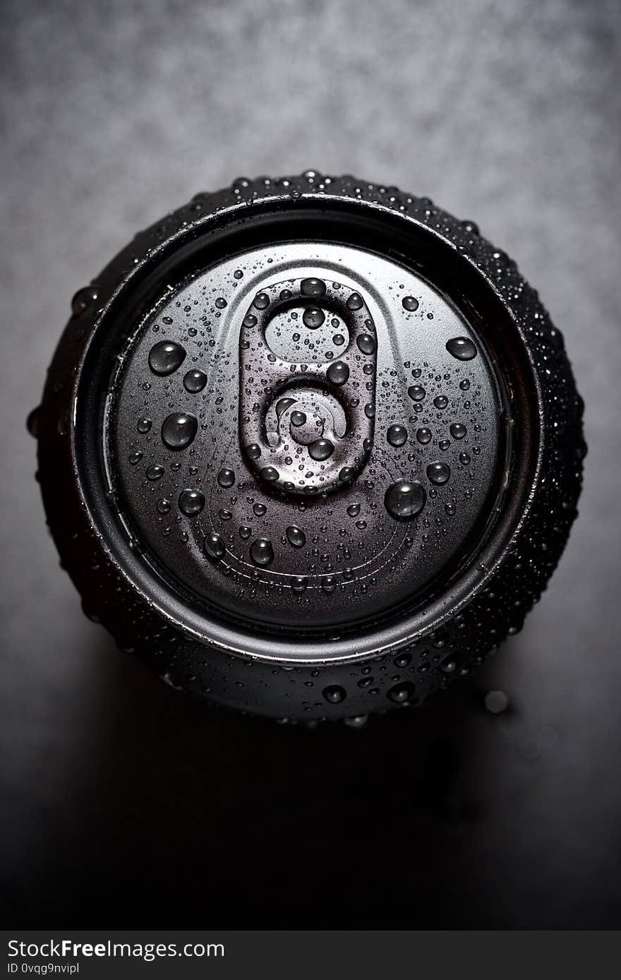 Close-up of a can of soda on a table. Close-up of a can of soda on a table