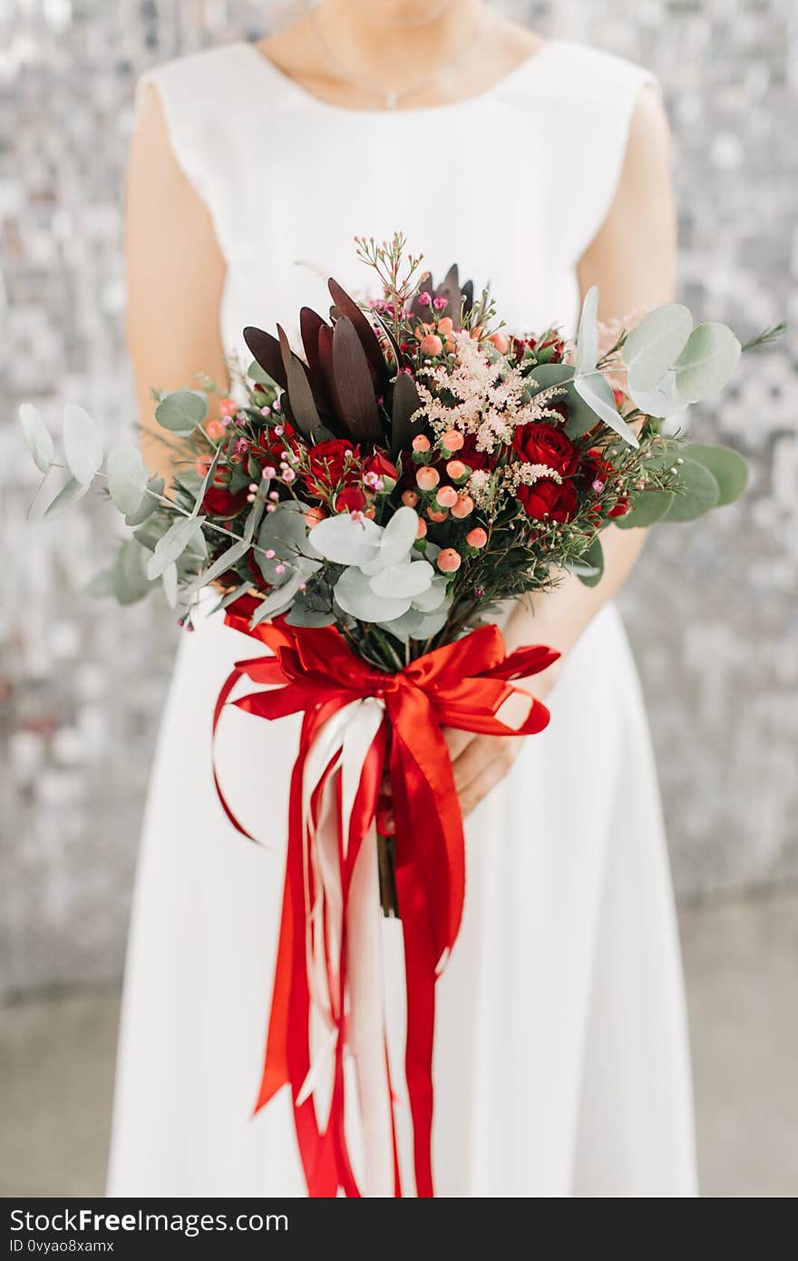 Blooming bouquet in the hands of the bride