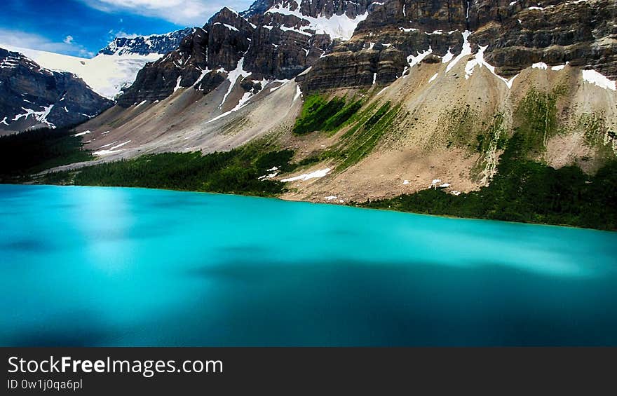 Moraine Lake is a glacially fed lake in Banff National Park, 14 kilometres outside the Village of Lake Louise, Alberta, Canada. It is situated in the Valley of the Ten Peaks, at an elevation of approximately 1,884 metres. The lake has a surface area of 50 hectares. Moraine Lake is a glacially fed lake in Banff National Park, 14 kilometres outside the Village of Lake Louise, Alberta, Canada. It is situated in the Valley of the Ten Peaks, at an elevation of approximately 1,884 metres. The lake has a surface area of 50 hectares.