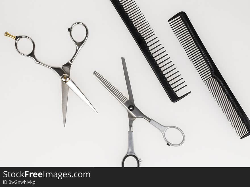 Scissors, hairbrush hairstyle set. barber set on light background