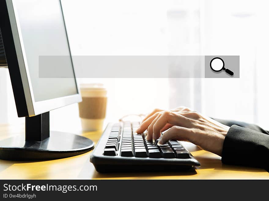 Woman using Computer, searching web, browsing information, having workplace at home / soft focus picture / Vintage concept