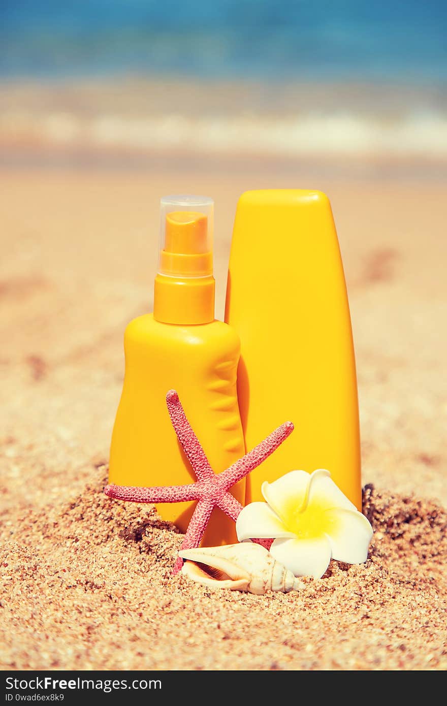 sunblock on the beach. Sun protection. Selective focus