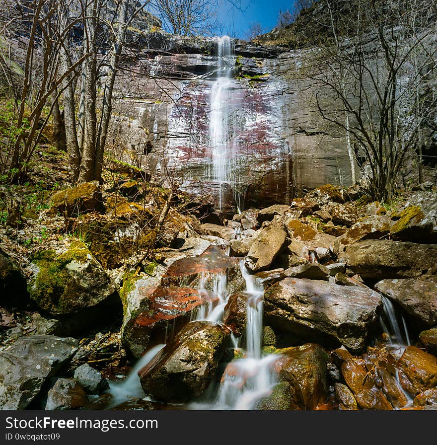 Waterfall in a forest on mountain. Called Cunguljski waterfall on old mountain stara planina in Serbia