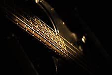 Bass Guitar In Music Studio Shot At Golden Hour Royalty Free Stock Photos