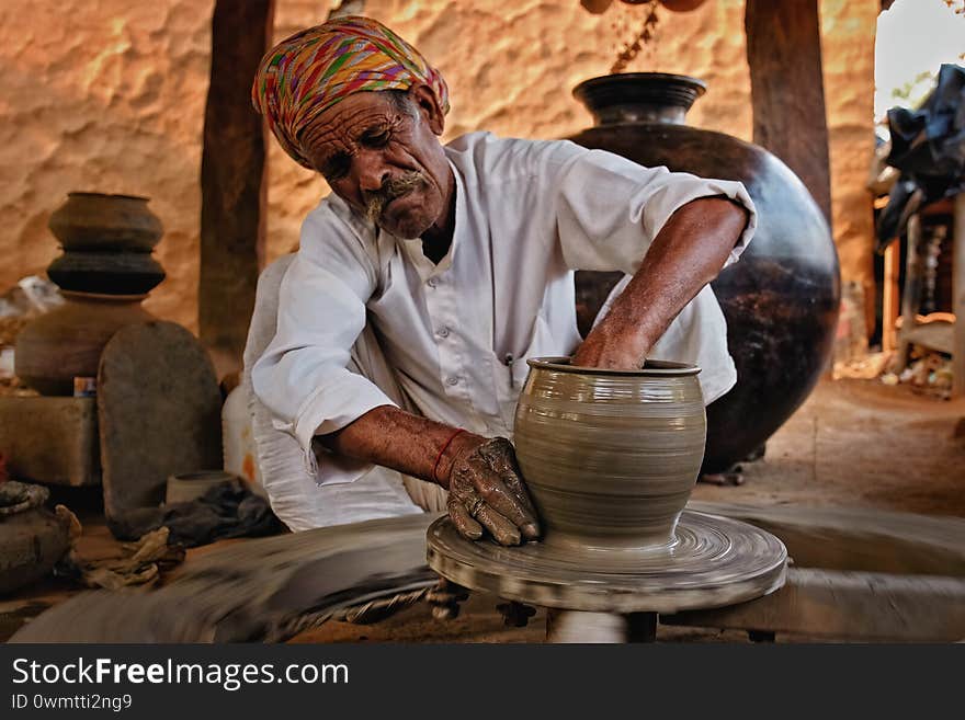 Indian Potter At Work. Handwork Craft From Shilpagram, Udaipur, Rajasthan, India