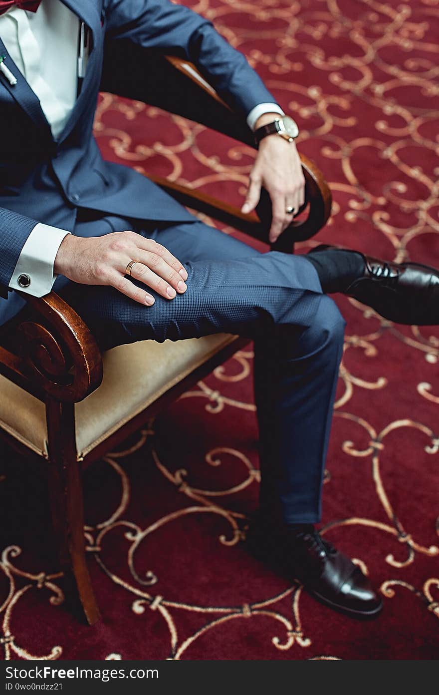 Portrait of a businessman sitting in arm chair