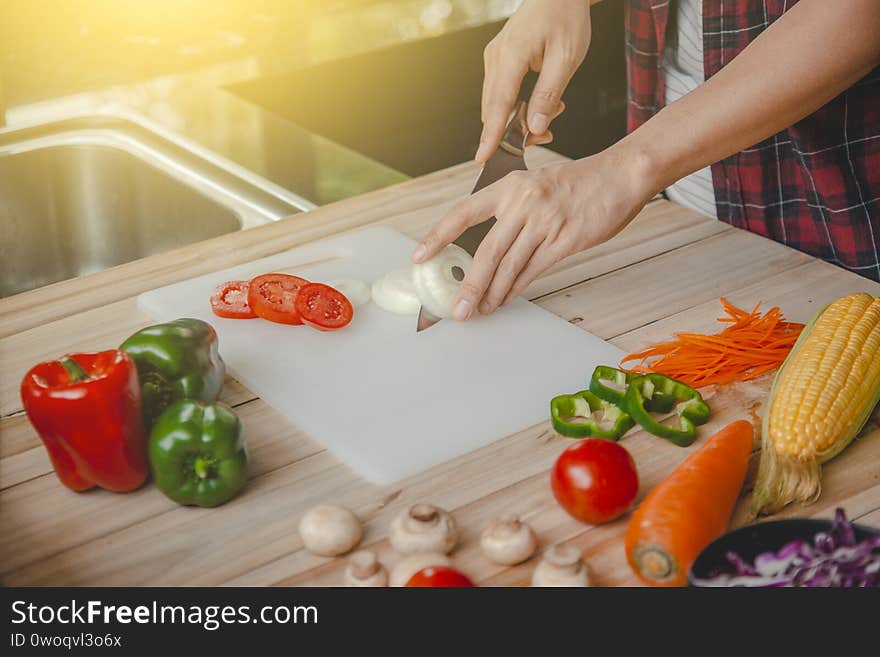 Photos of people cooking in the kitchen Can be used with various design media.