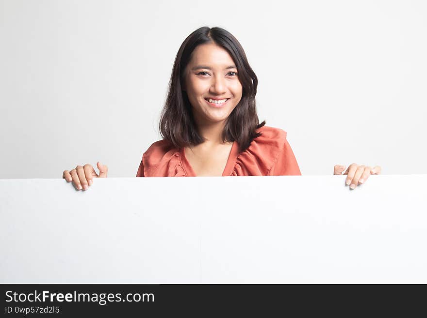 Young Asian woman with blank sign