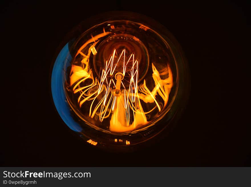 Light bulb close up on a dark background