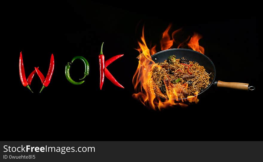 Word wok on a dark background asian wok