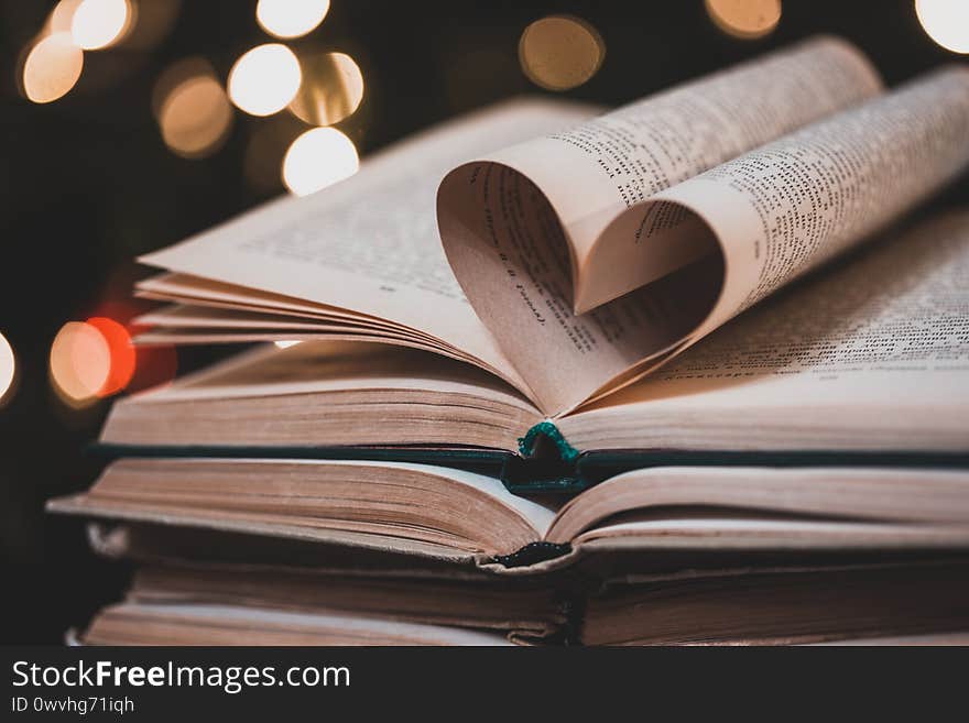 Heart shaped book pages. Christmas atmosphere