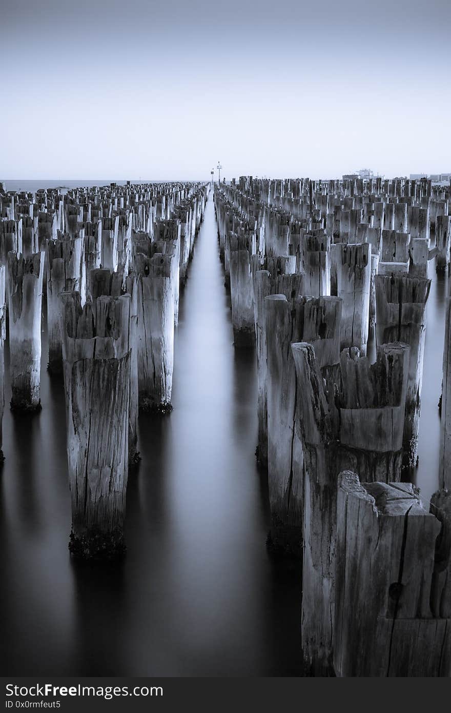 Long exposure of broken  Princess Pier in  Melbourne  low saturation. Long exposure of broken  Princess Pier in  Melbourne  low saturation