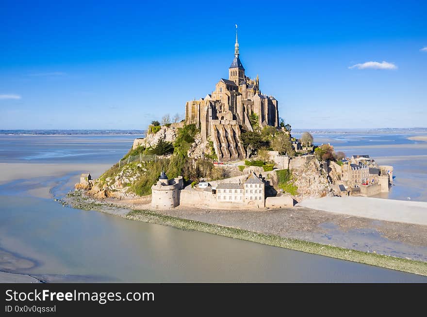 Aerial The famous of top view with blue sky at Mont-Saint-Michel, Normandy, France