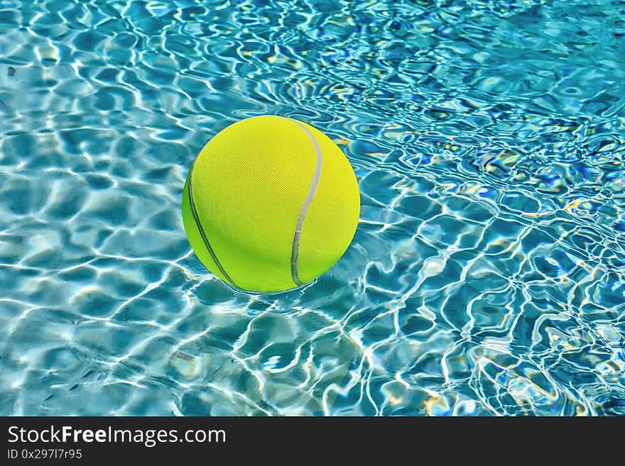 Giant  Beach Ball In Water. Isolated