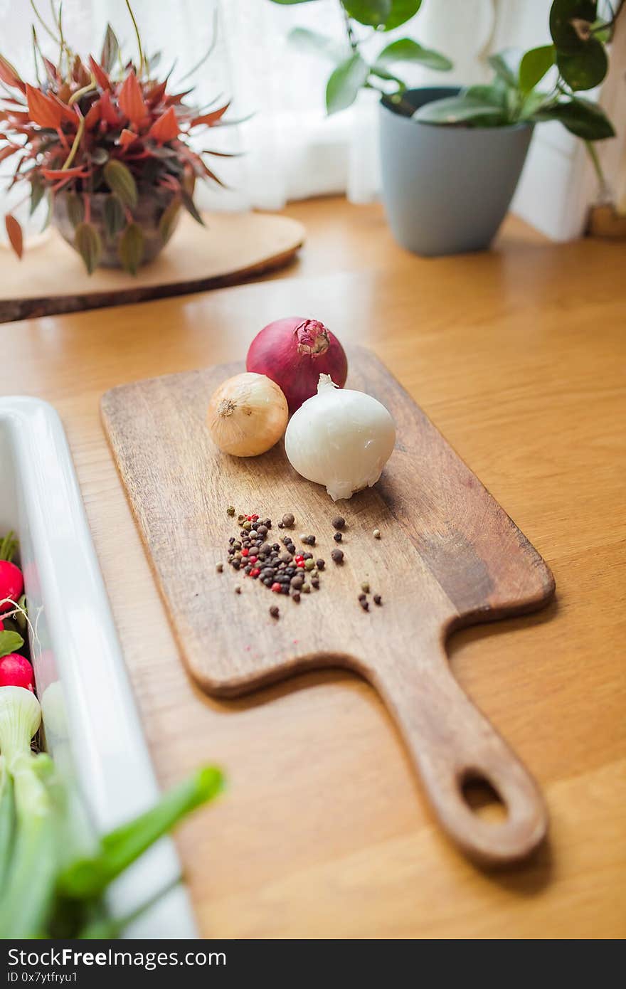 Onions pepper and cutting board