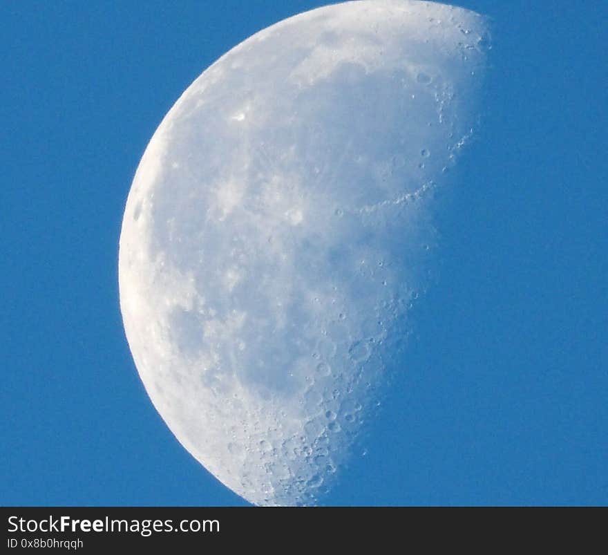 Waning Gibbous moon phase on a hot southern mid afternoon sky