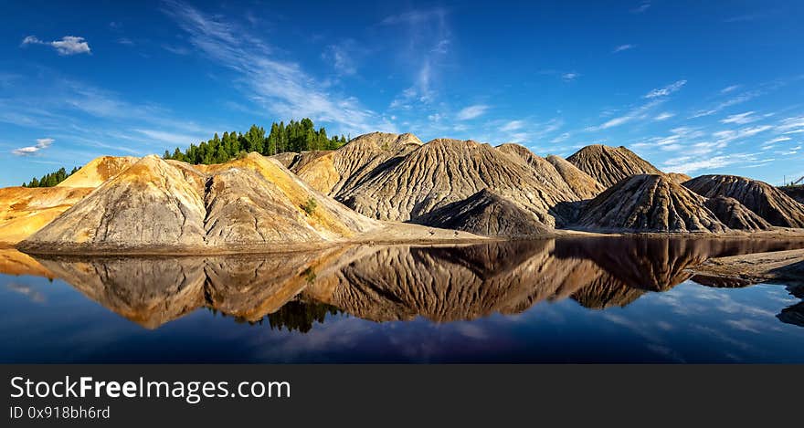 Industrial dumps of a construction company, Russia, Ural June. Industrial dumps of a construction company, Russia, Ural June