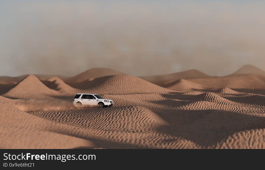 Desert Safari in Dubai. White suv at sunset. Off road travel theme landscape