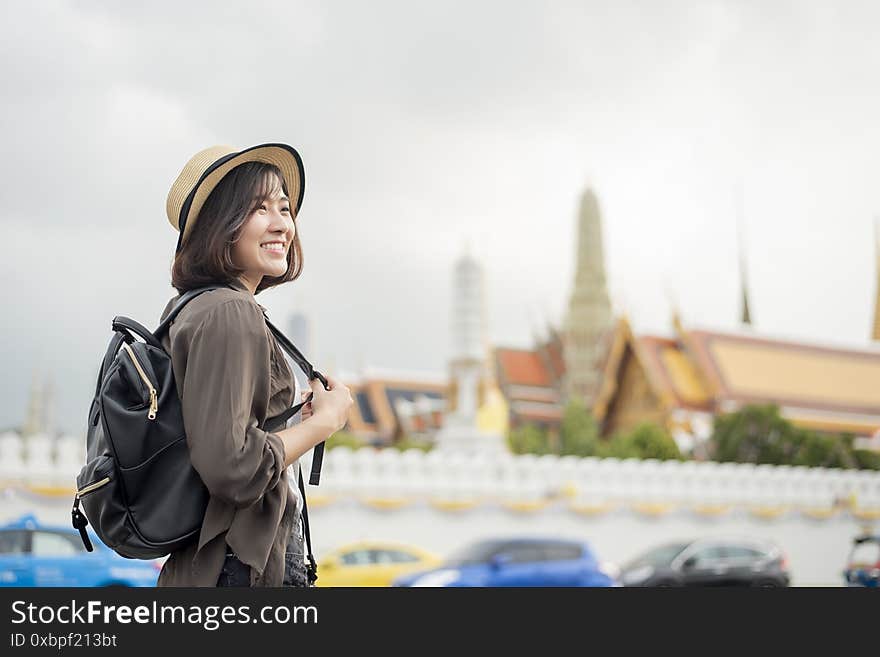 A Young Asian travel woman is enjoying with beautiful place in Bangkok, Thailand