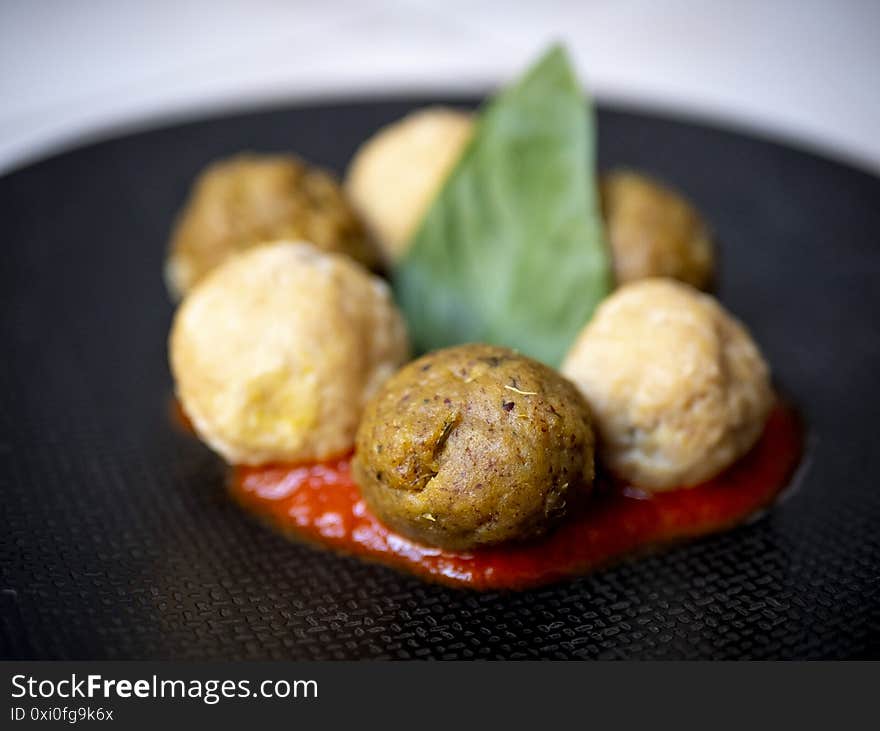 Vegan Legume Meatballs With Fresh Tomato Sauce And Basil Leafe