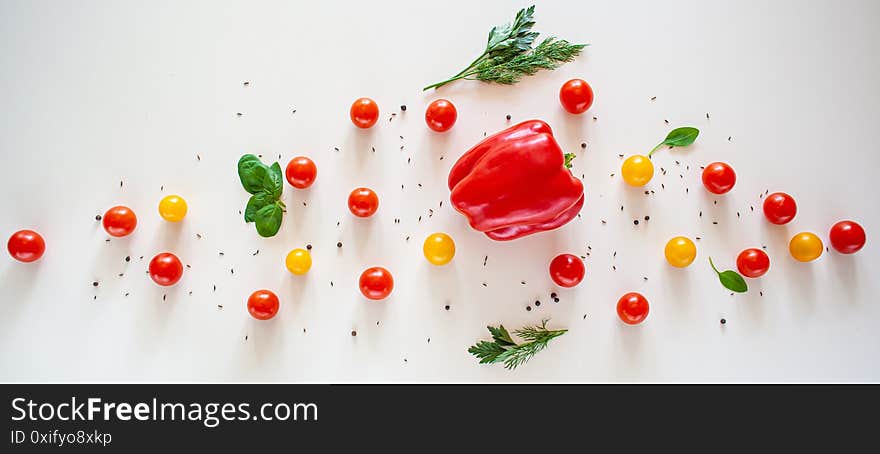 Pepper, Cherry Tomatoes Yellow And Red, Spices On A White Background. View From Above.