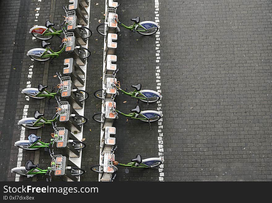 Row of parking lot of sharing bicycles on downtown road main shopping street, Beijing Road