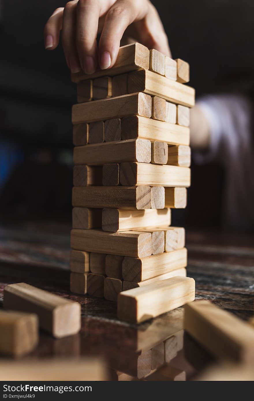 A vertical shot of wooden tower from blocks