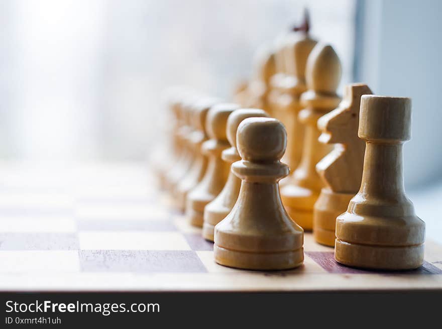 Arrangement of chess pieces on a chessboard.