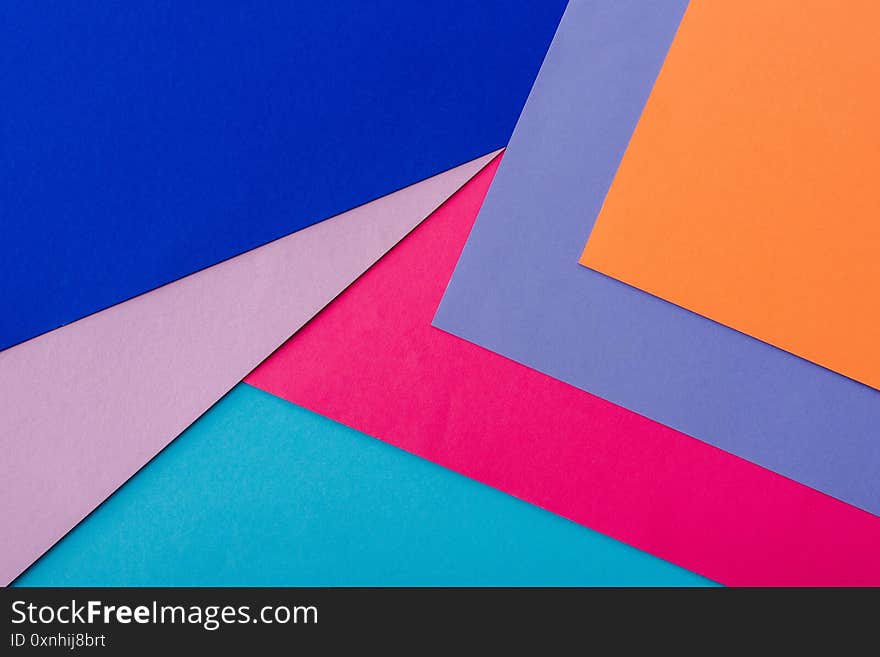 Abstract geometric background with orange, pink, blue and violet