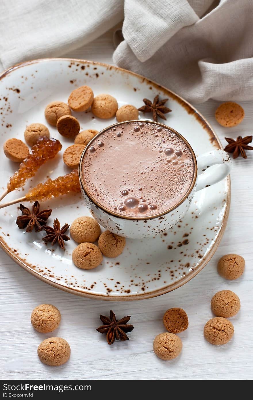 Hot cocoa drink with cookies, anise and  vanilla