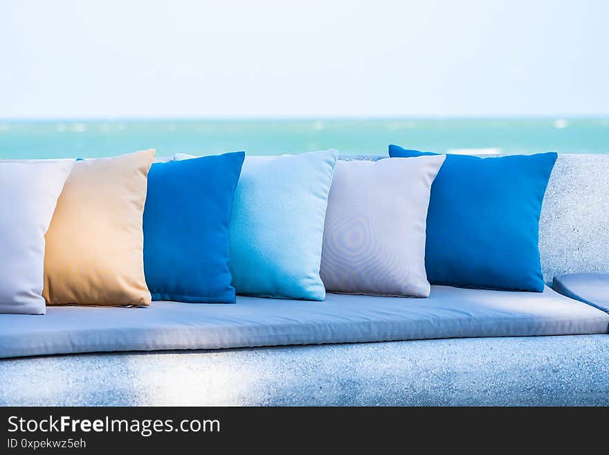 Pillow on chair or sofa lounge around outdoor patio with sea ocean beach view