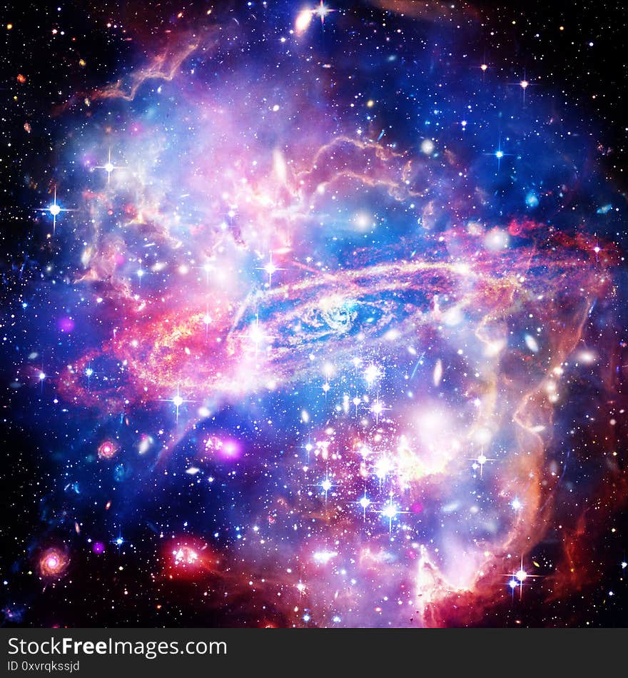 Space Background with Colorful Galaxy Cloud Nebula. The elements of this image furnished by NASA Space and science theme.