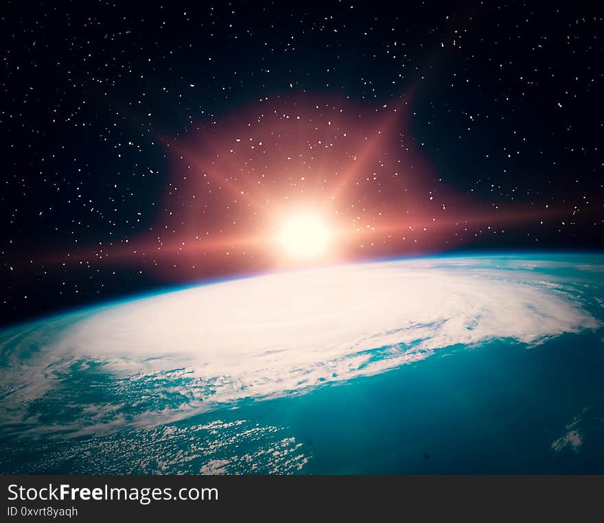 Sunflare and the earth from space. The elements of this image furnished by NASA Space and science theme.