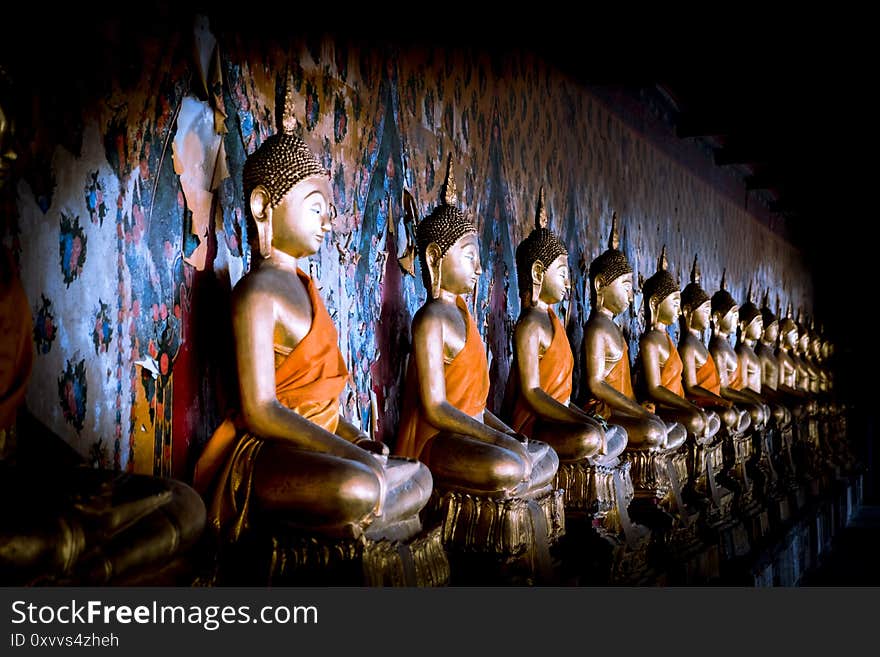 The Buddha at Wat Arun Bangkok Thailand to Buddhist or tourists pay homage