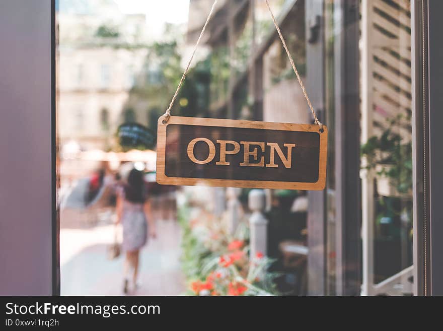 Sign open on the door of the restaurant. open signboard. Open