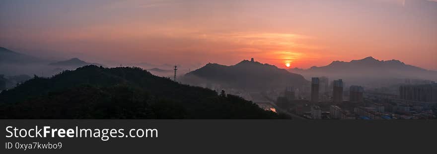 Sunrise  in Xinglong County, Hebei Province, ChinaA house in the clouds is a fairyland