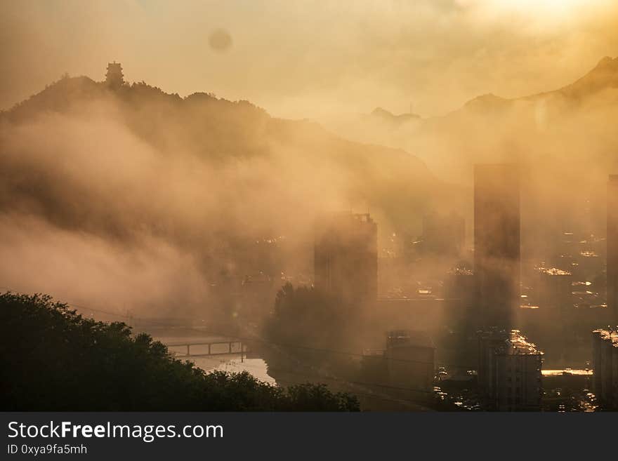 A small town in mountains In the clouds