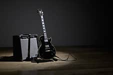 Electric Guitar And Amplifier On Stage Stock Photo