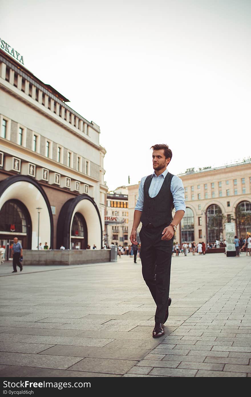 Attractive man. businessman working walking around the city