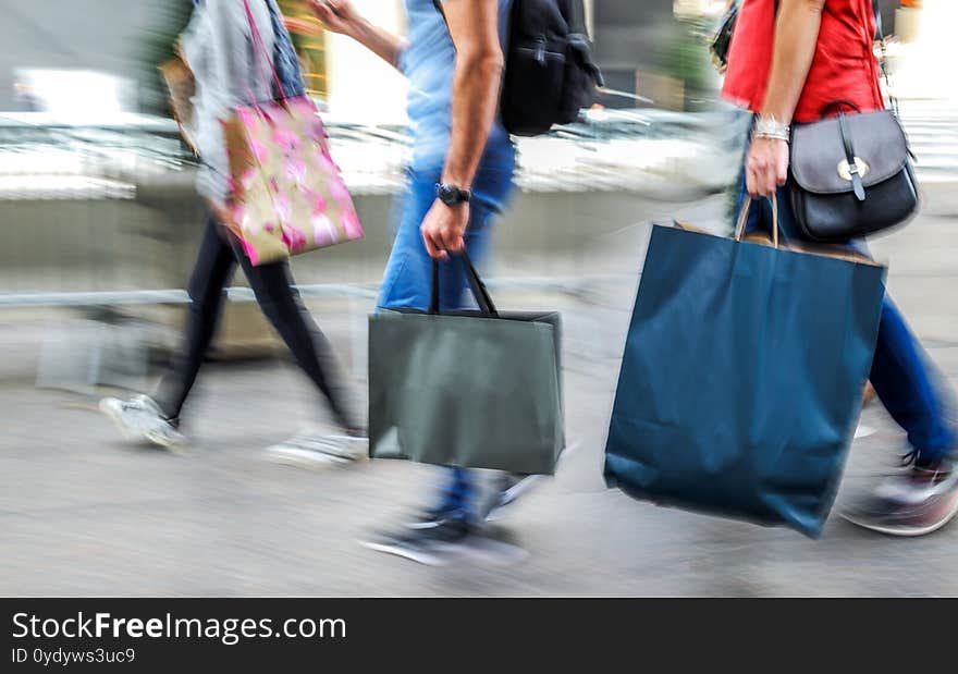 People shopping in the city in motion blur. People shopping in the city in motion blur