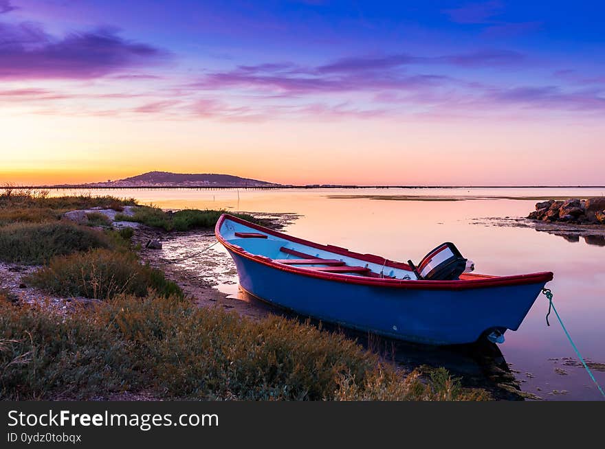 Rowboat on the Etang de Thau à Meze at dusk, in Hérault in Occitanie, France