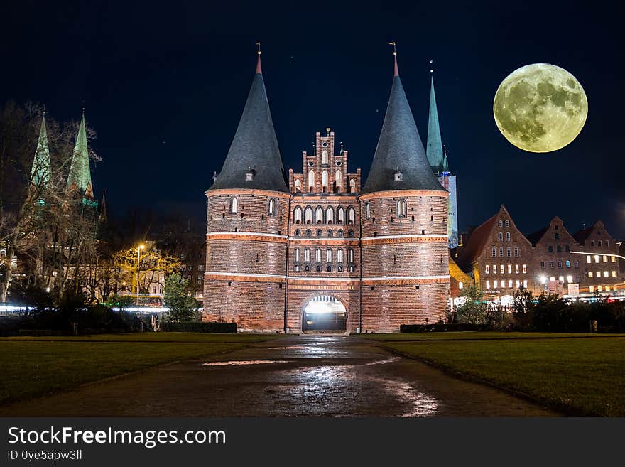 Holstentor Luebeck in Germany with Moon