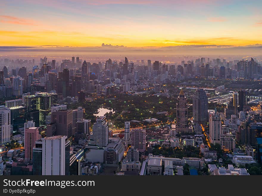 Aerial view of Bangkok Downtown Skyline with fog. Thailand. Financial district and business centers in smart urban city in Asia.