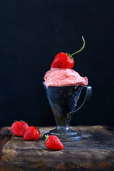 Strawberries Ice Cream In Black Background Royalty Free Stock Images