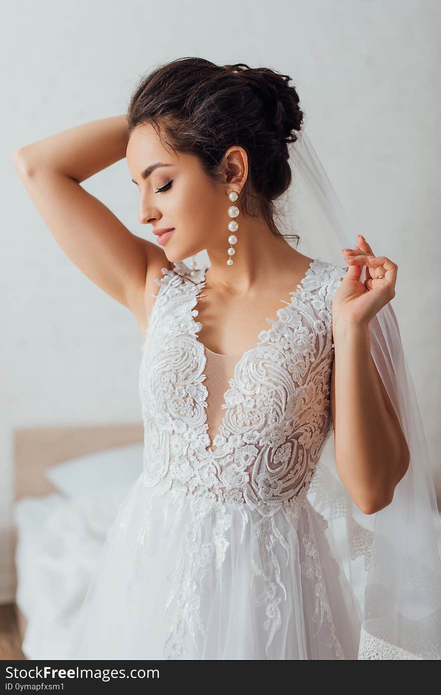 Bride with closed eyes in lace