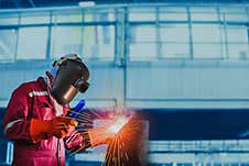 Welder Is Welding In Factory Royalty Free Stock Photography