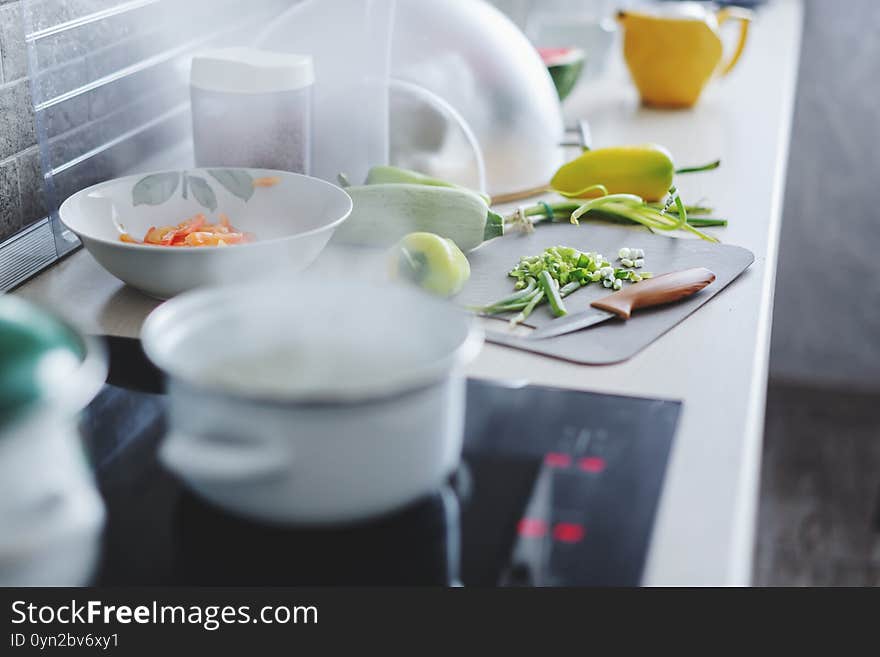 Steaming pot with vegetables in the kitchen