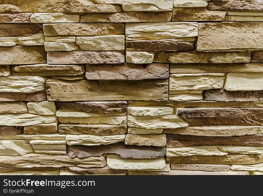 Dark And Light Brown Bricks In Wall Texture